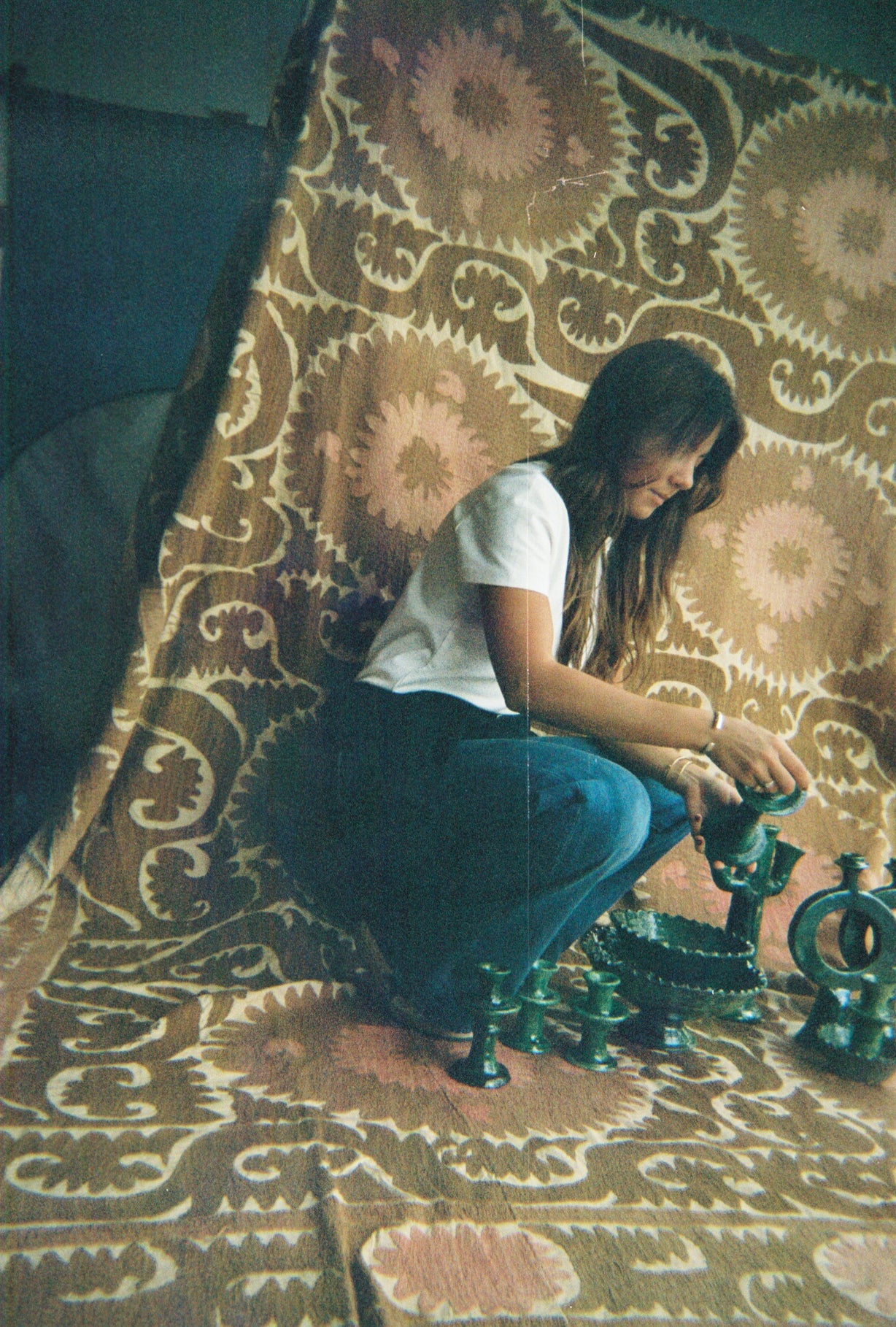 Catarina standing in front of a decorated doorway